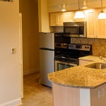 Each unit features a gourmet kitchen with marble countertops & stainless steel appliances. 